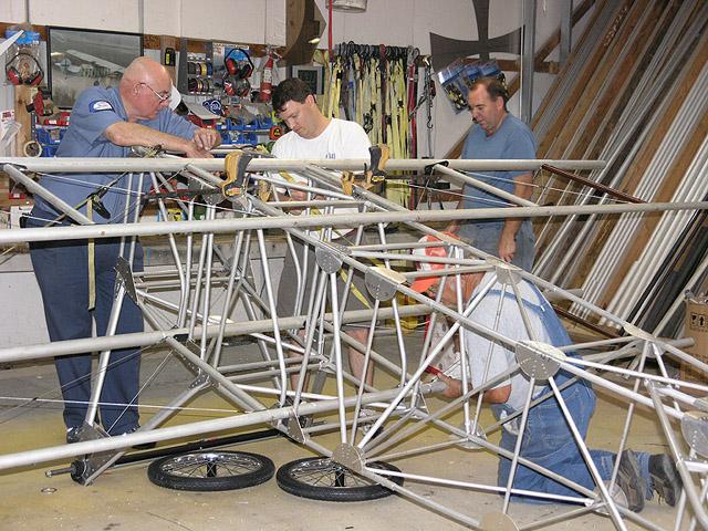 endday3.JPG - Emil, John, Robert and Jim working on the wings.
